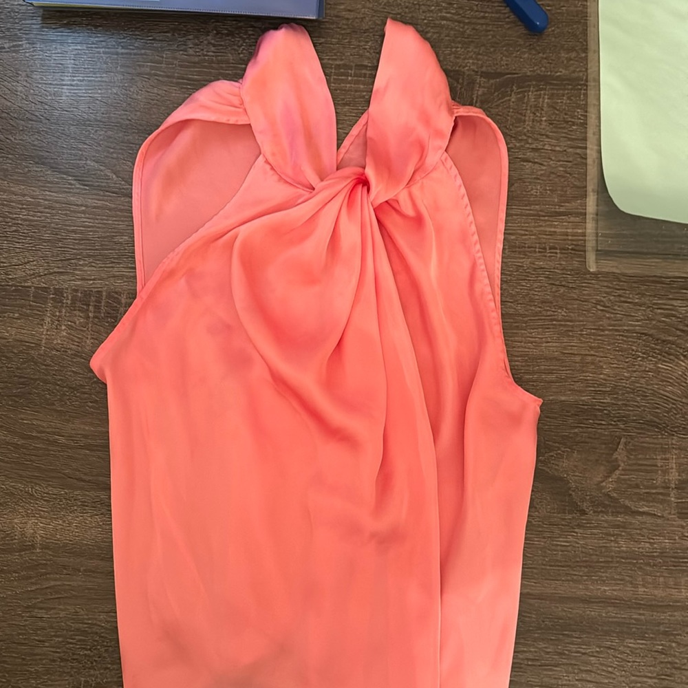 Pink silky sleeveless blouse